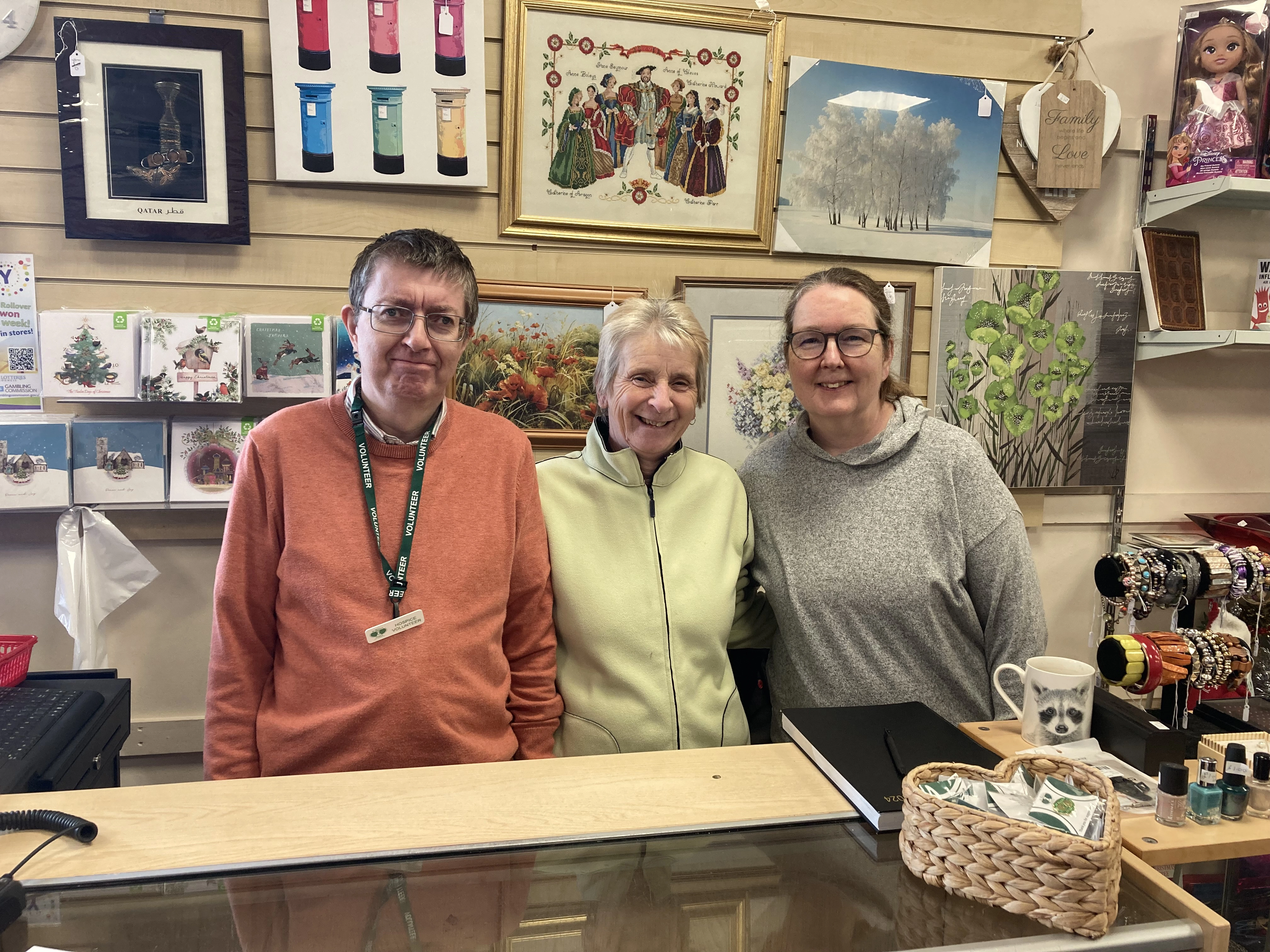 A photo of 3 St. Rocco's shop volunteers smiling